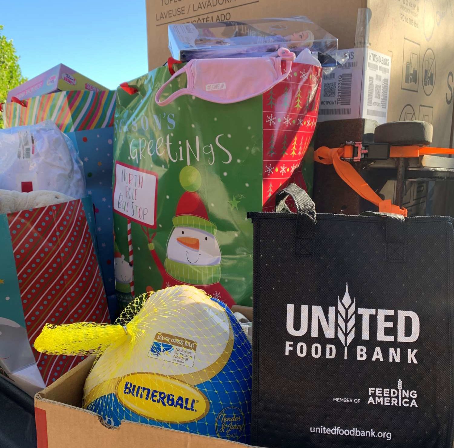 United Food Bank helps deliver Christmas Wishes for Johnjay & Rich