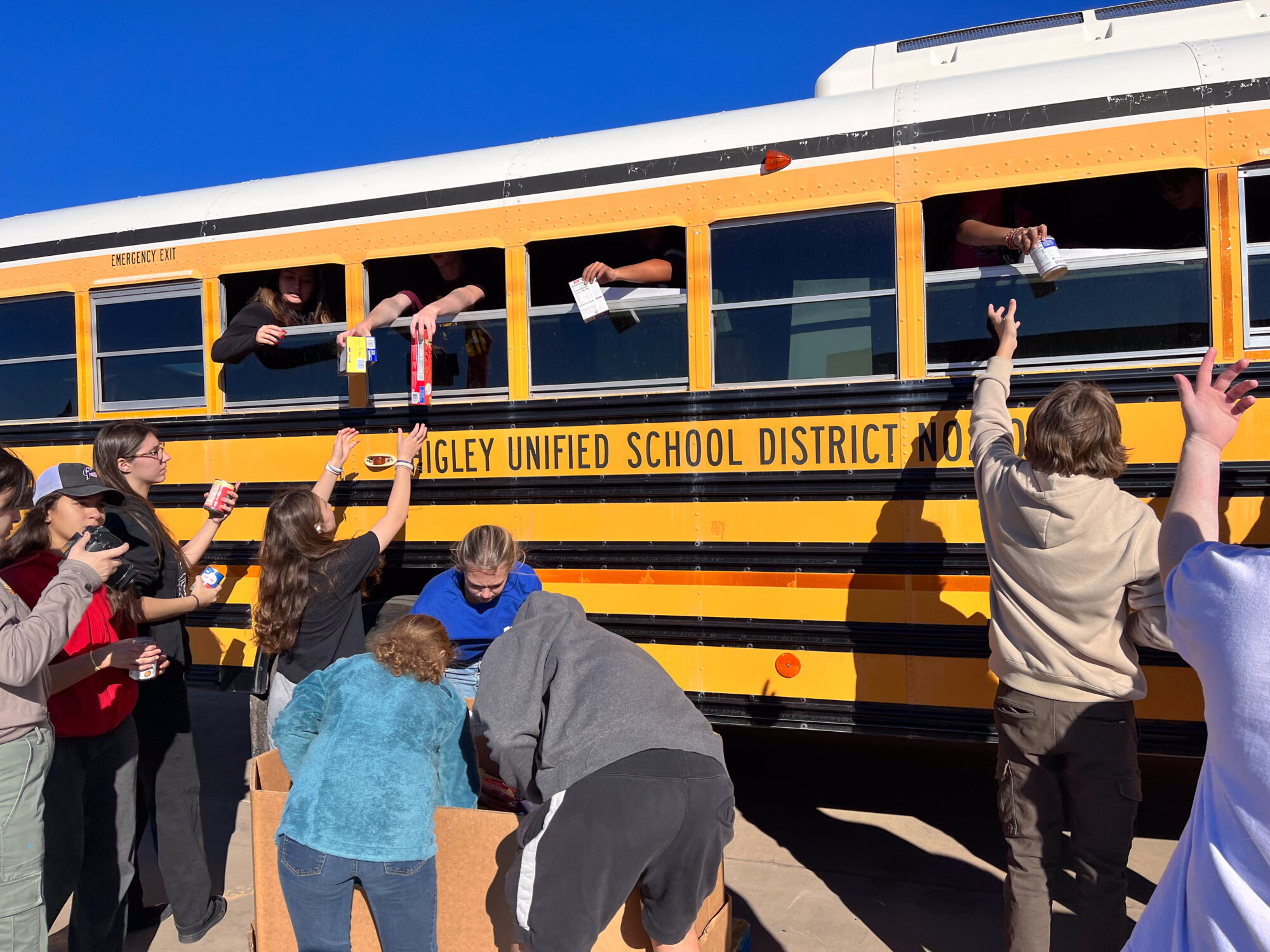 Dedicated High School Students Stuff the Bus to Help United Food Bank Feed Neighbors!